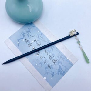 Horquilla con borlas en forma de abanico