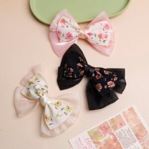 Pinza de pelo con lazo floral colorido