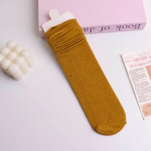 Medias de mujer de color amarillo jengibre con ribetes